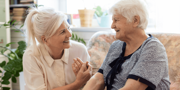 A woman spending time with her elderly mother