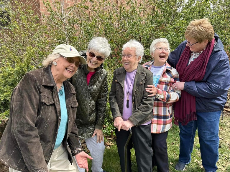 Heritage House residents on Earth Day having a good time and smiling