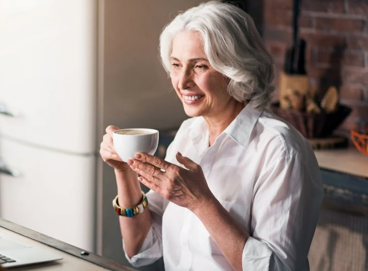 senior woman drinking coffee