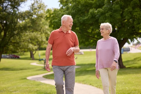 Senior couple happy enjoying a walk