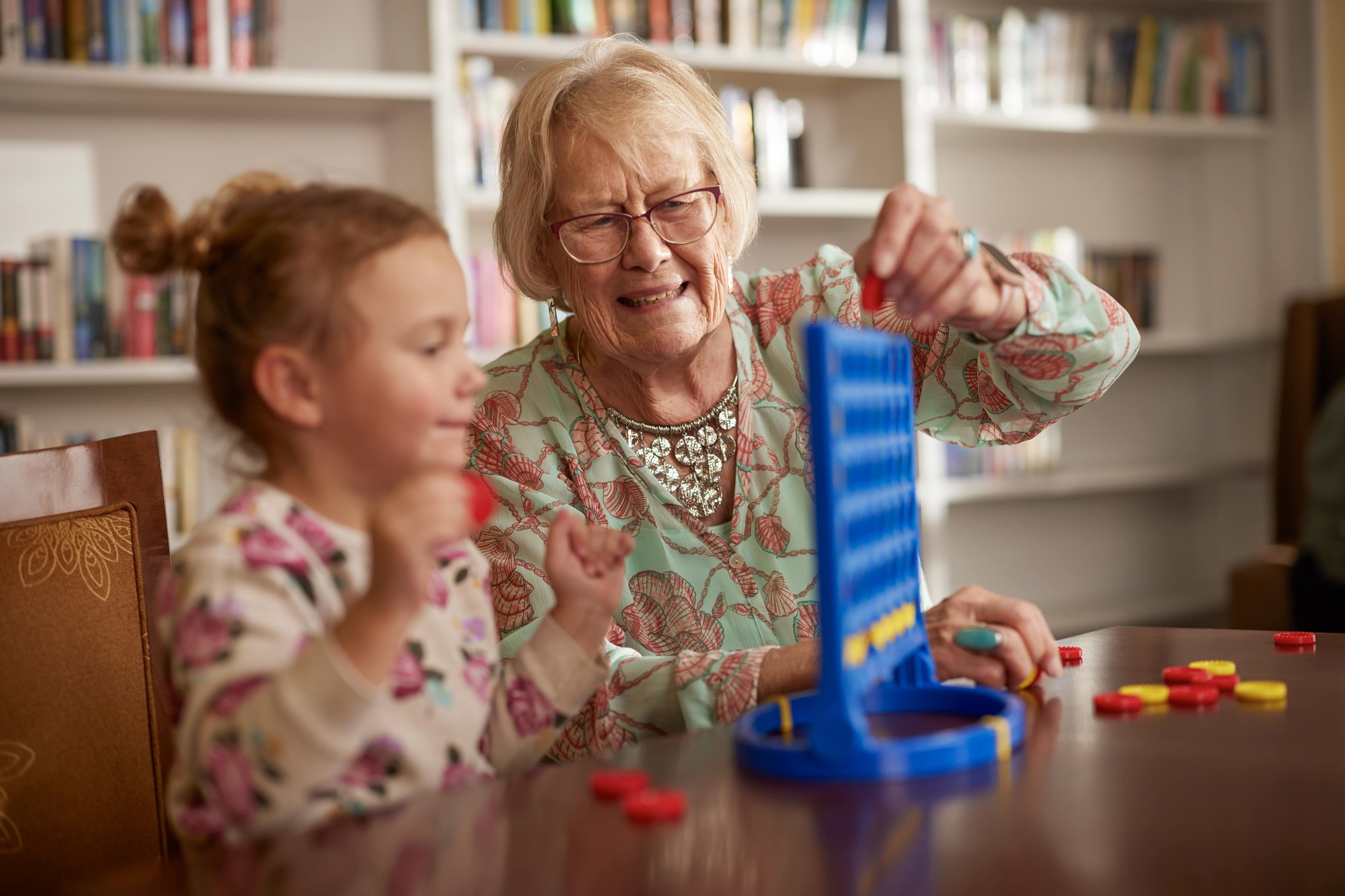 Grandmother playing a game with her grandchilden